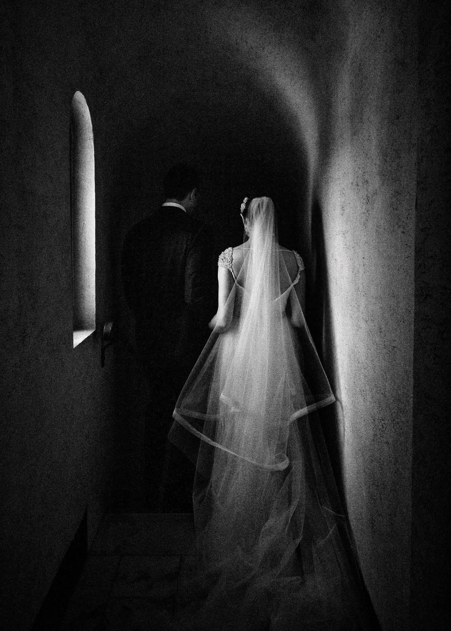 Couple entering a corridor